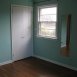 Bedroom No. 1 with closet and front window