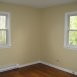Bedroom No. 2 with two windows and ceiling fan